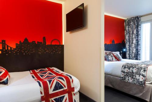 Habitación Familiar con 1 cama grande, 1 cama doble y 1 cama supletoria del hotel Aurore Paris Gare de Lyon. Foto 5