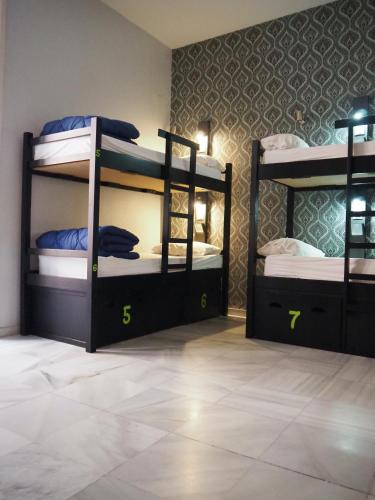 Cama en habitación compartida mixta de 8 camas del hotel JOY Plaza de Armas