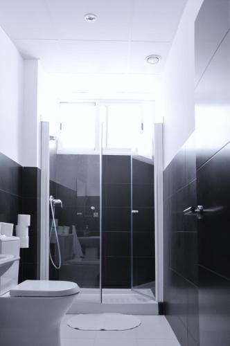 Habitación Cuádruple con baño privado del hotel JOY Plaza de Armas. Foto 2