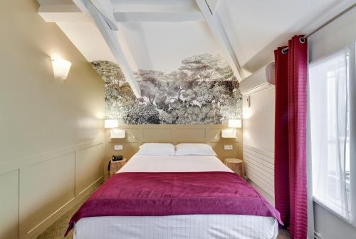 Habitación Doble Clásica del hotel Passy Eiffel. Foto 1