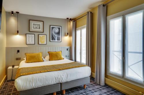 Habitación Doble Superior del hotel Passy Eiffel. Foto 1