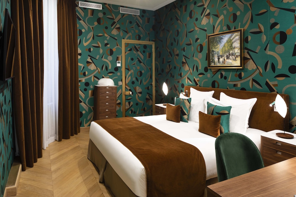 Habitación Deluxe con 2 camas individuales del hotel Pas De Calais. Foto 1