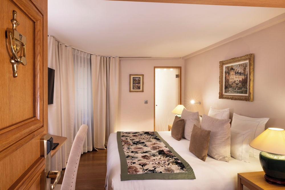 Habitación superior con 2 camas individuales del hotel Pas De Calais. Foto 2