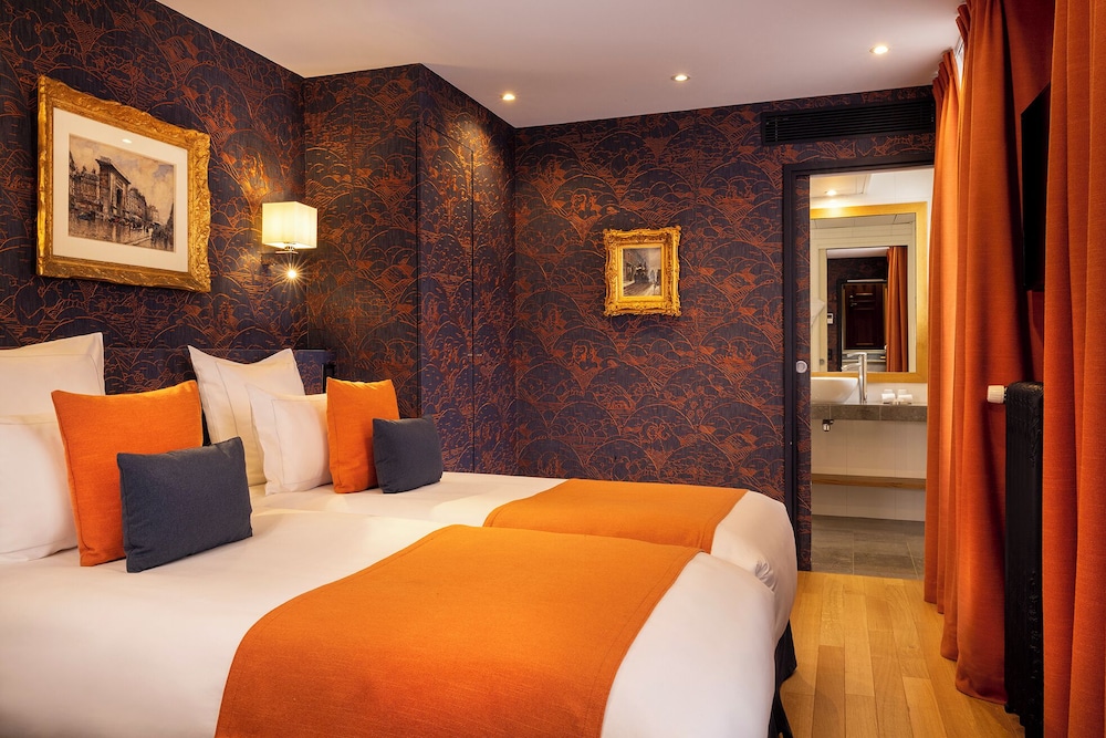 Habitación superior con 2 camas individuales del hotel Pas De Calais. Foto 3