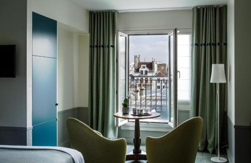 Habitación Doble Deluxe con terraza del hotel Parc Saint Severin. Foto 1