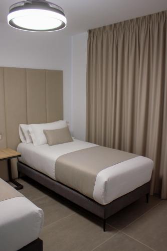 Habitación Doble Familiar del hotel Costa Adeje Garden. Foto 7