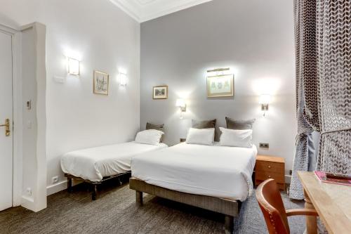 Habitación Triple - 2 camas del hotel Opéra Maintenon. Foto 2