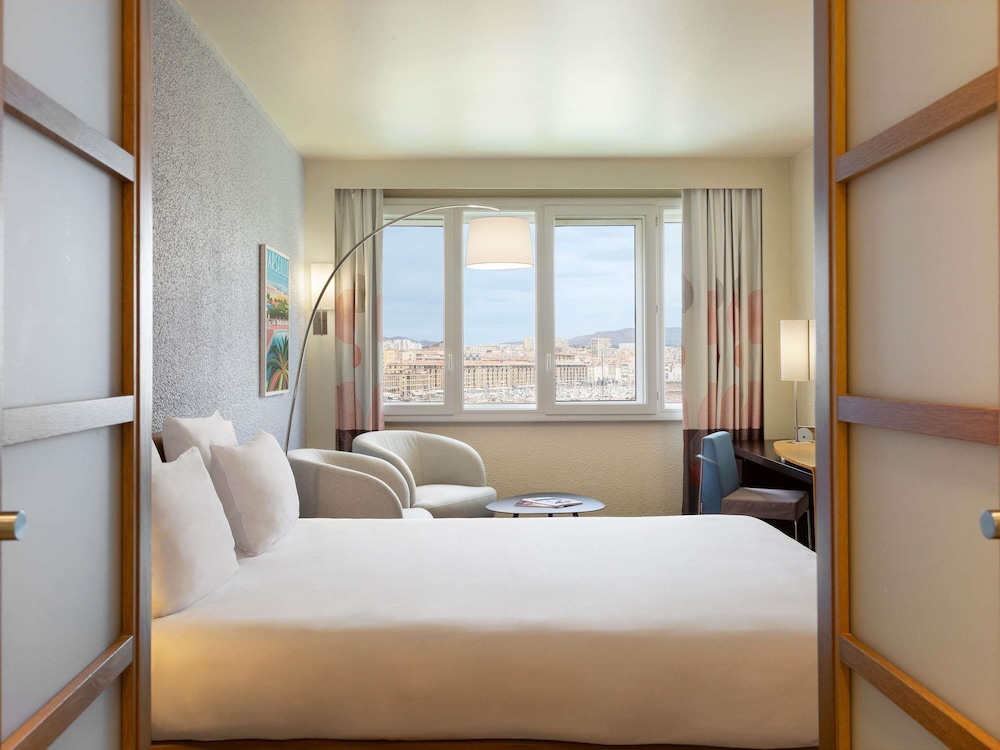 Habitación Deluxe con 1 cama queen size, Vistas al puerto del hotel Novotel Marseille Vieux Port