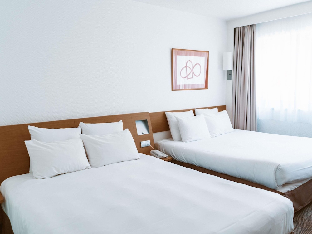 Habitación Standard con 2 camas queen size del hotel Novotel Resort and Spa Biarritz Anglet