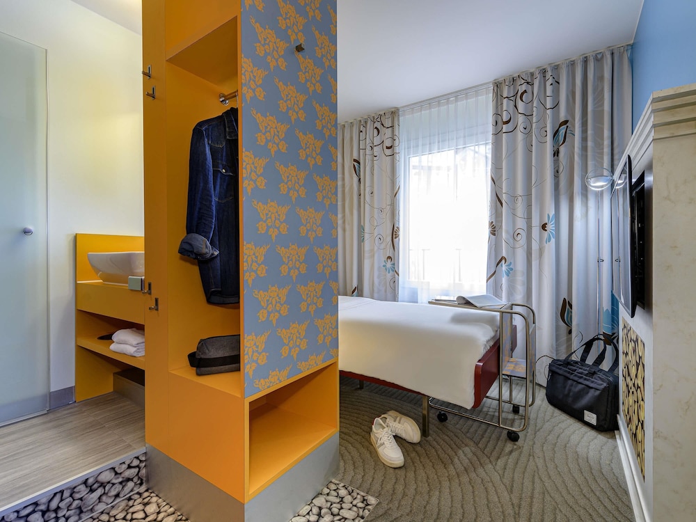 Habitación Estándar con 1 cama individual del hotel Ibis Styles Berlin Mitte. Foto 3