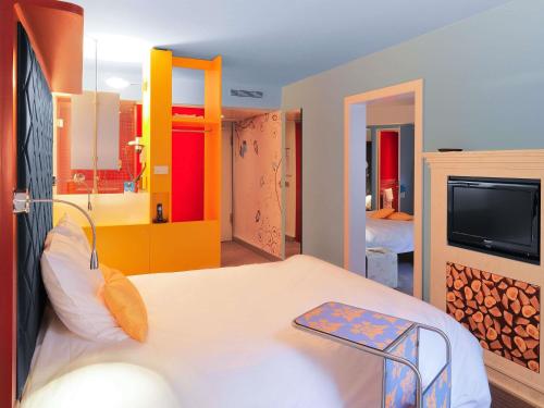 Suite familiar: 2 habitaciones con puerta de comunicación del hotel Ibis Styles Berlin Mitte. Foto 10