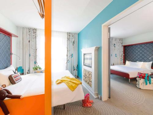 Suite familiar: 2 habitaciones con puerta de comunicación del hotel Ibis Styles Berlin Mitte. Foto 11