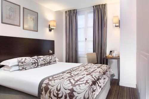 Habitación Clásica del hotel Paris Louvre Opéra
