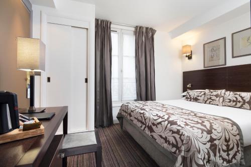 Habitación Clásica del hotel Paris Louvre Opéra. Foto 4