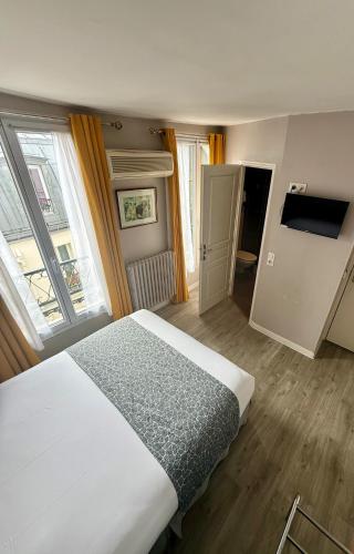 Habitación Doble del hotel New Gare Du Nord. Foto 4