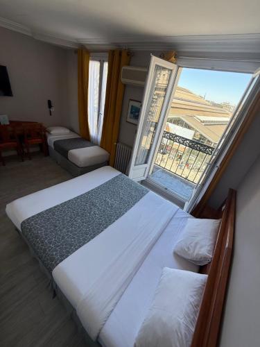 Habitación Triple del hotel New Gare Du Nord. Foto 2
