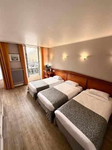 Habitación Triple del hotel New Gare Du Nord. Foto 4