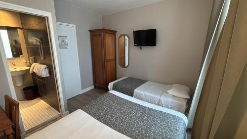 Habitación Triple del hotel New Gare Du Nord. Foto 5