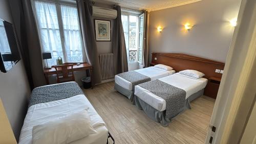 Habitación Triple del hotel New Gare Du Nord. Foto 6