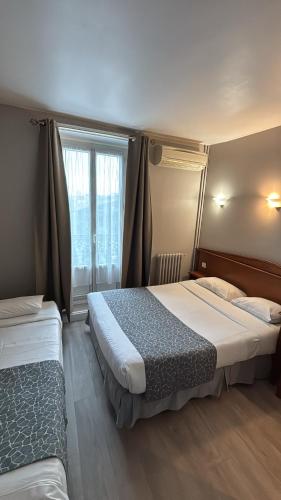Habitación Triple del hotel New Gare Du Nord. Foto 8