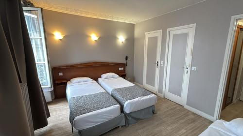 Habitación Triple del hotel New Gare Du Nord. Foto 10
