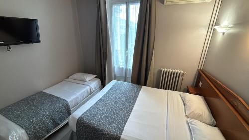 Habitación Triple del hotel New Gare Du Nord. Foto 11