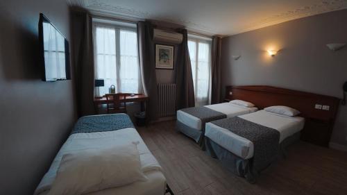 Habitación Triple del hotel New Gare Du Nord. Foto 13