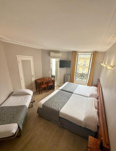 Habitación Quíntuple del hotel New Gare Du Nord. Foto 1