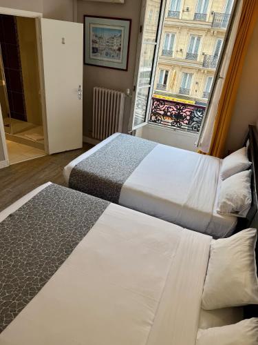 Habitación cuádruple del hotel New Gare Du Nord