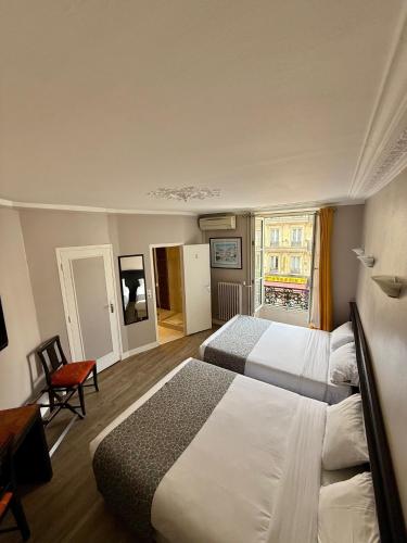 Habitación cuádruple del hotel New Gare Du Nord. Foto 2