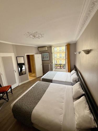 Habitación cuádruple del hotel New Gare Du Nord. Foto 3