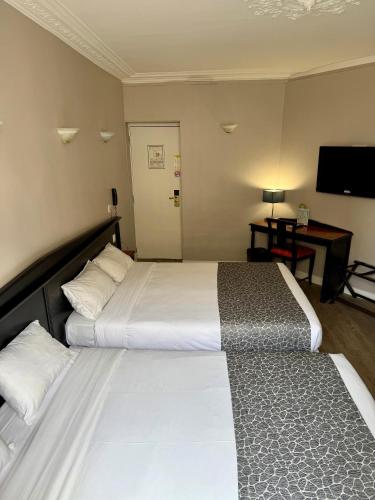 Habitación cuádruple del hotel New Gare Du Nord. Foto 7