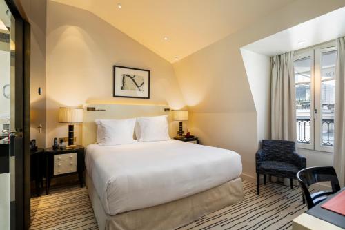 Habitación Doble Deluxe con vistas a la ciudad del hotel Montaigne. Foto 4