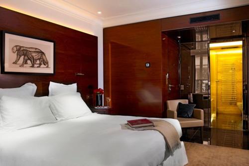 Habitación Doble Deluxe del hotel Montaigne. Foto 4