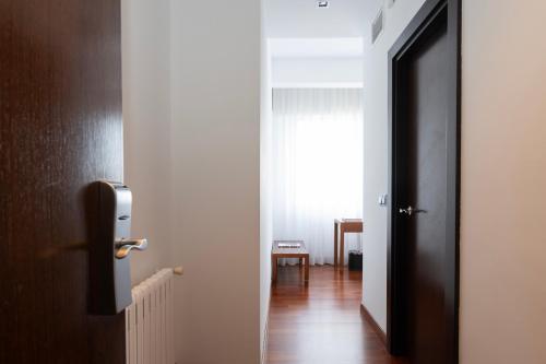 Habitación Doble Confort - 1 o 2 camas del hotel Maroa. Foto 15