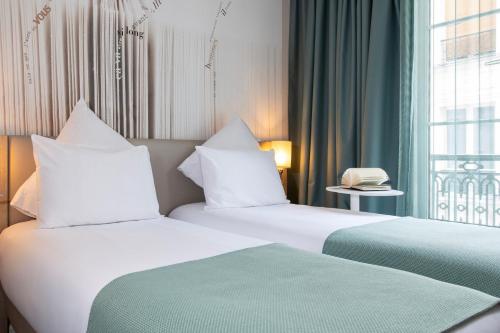 Habitación Doble Clásica - 2 camas del hotel Mercure Paris Montparnasse Raspail. Foto 5