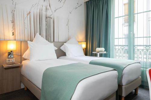 Habitación Doble Clásica - 2 camas del hotel Mercure Paris Montparnasse Raspail. Foto 8