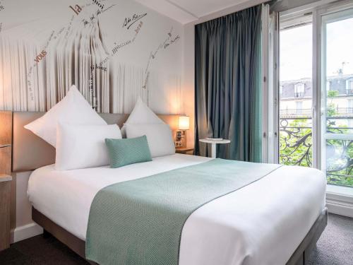 Privilege Double Room with 1 King Bed del hotel Mercure Paris Montparnasse Raspail. Foto 2