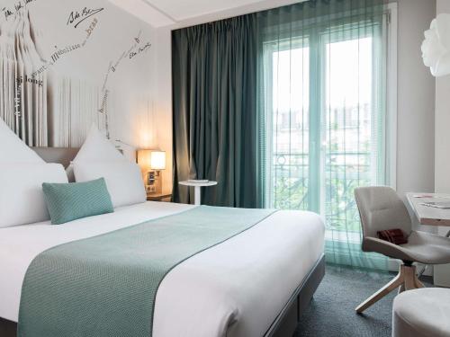 Privilege Double Room with 1 King Bed del hotel Mercure Paris Montparnasse Raspail. Foto 5
