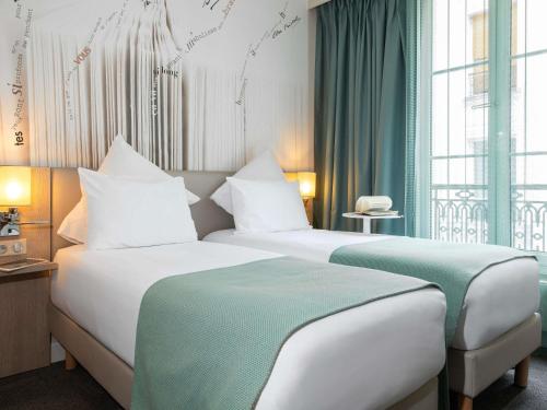 Habitación Doble Clásica - 2 camas del hotel Mercure Paris Montparnasse Raspail. Foto 5