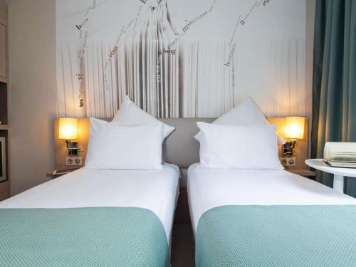 Habitación Doble Clásica - 2 camas del hotel Mercure Paris Montparnasse Raspail. Foto 8