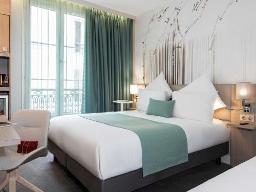 Habitación Doble Privilege con sofá cama del hotel Mercure Paris Montparnasse Raspail. Foto 4