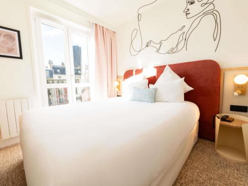Habitación Clásica reformada del hotel Mercure Paris Montparnasse Raspail. Foto 1