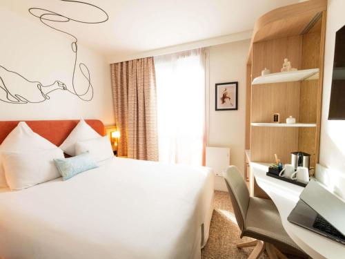 Habitación Clásica reformada del hotel Mercure Paris Montparnasse Raspail. Foto 6