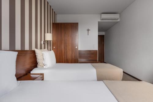 Habitación Doble Estándar - 1 o 2 camas del hotel Crisol Tres Pastorinhos. Foto 1