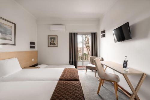 Habitación Doble con balcón y vistas al santuario - 2 camas individuales del hotel Crisol Tres Pastorinhos