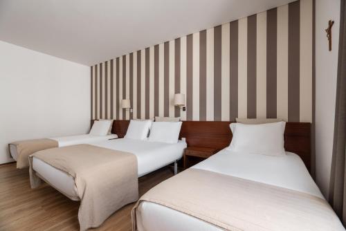 Habitación Triple del hotel Crisol Tres Pastorinhos. Foto 1