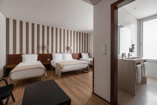 Habitación Triple del hotel Crisol Tres Pastorinhos. Foto 2