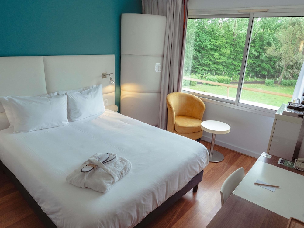 Habitación Privilege con una cama doble del hotel Mercure Brive