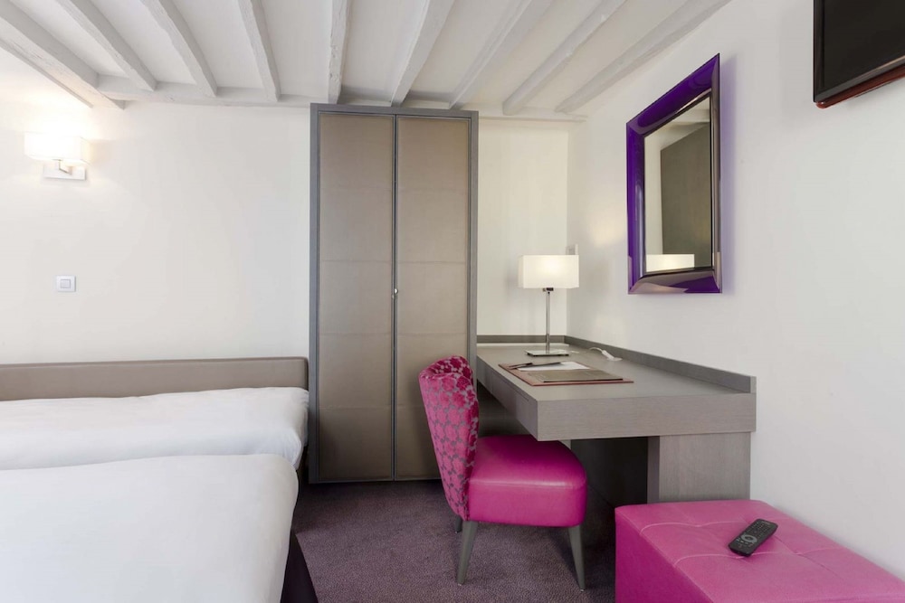 Habitación con 2 camas individuales del hotel Masséna. Foto 1